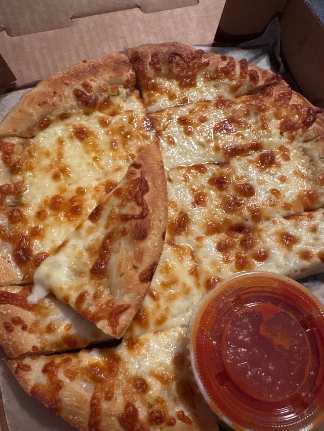 Bread Sticks with Marinara Sauce.